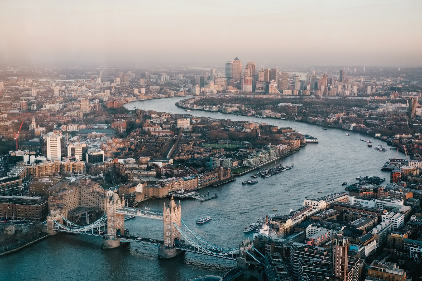 Aerial photograph of London skyline with Tower of London in the foreground.