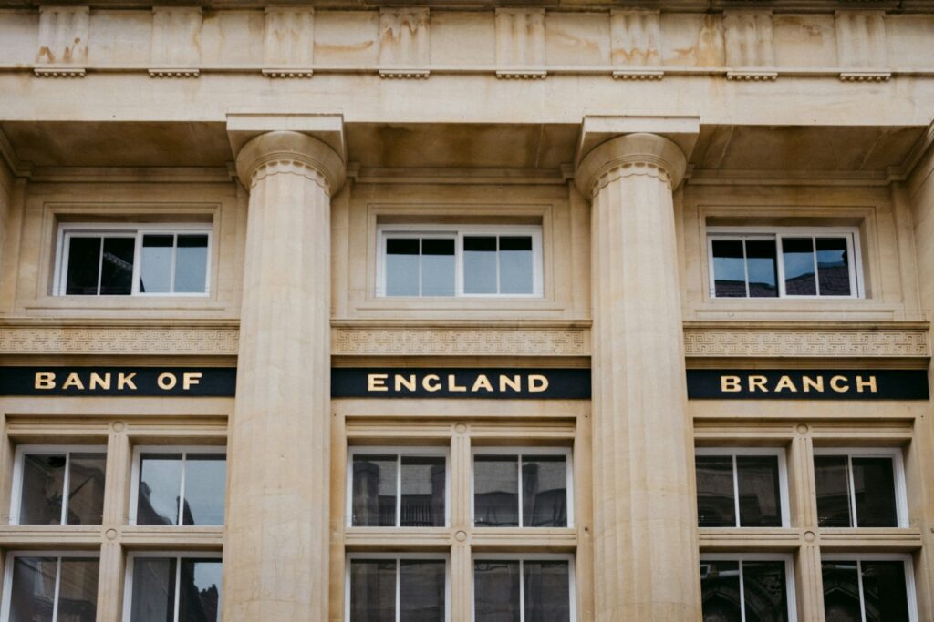 A bank of england building with three pillars