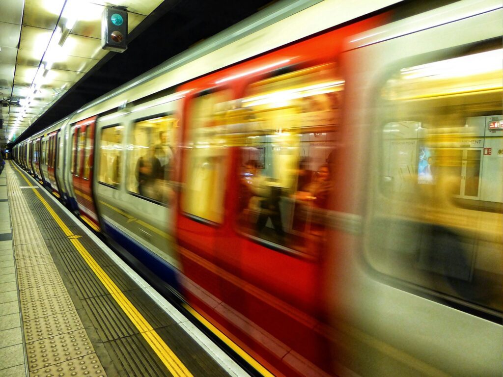 London underground tube moving into a station