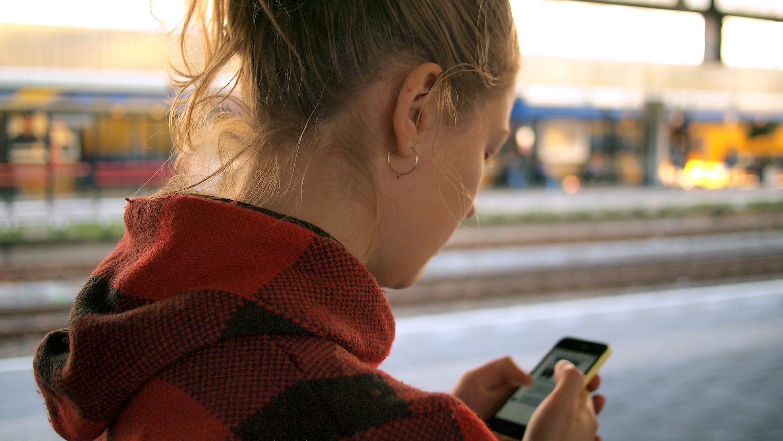 holding a phone to plan a journey