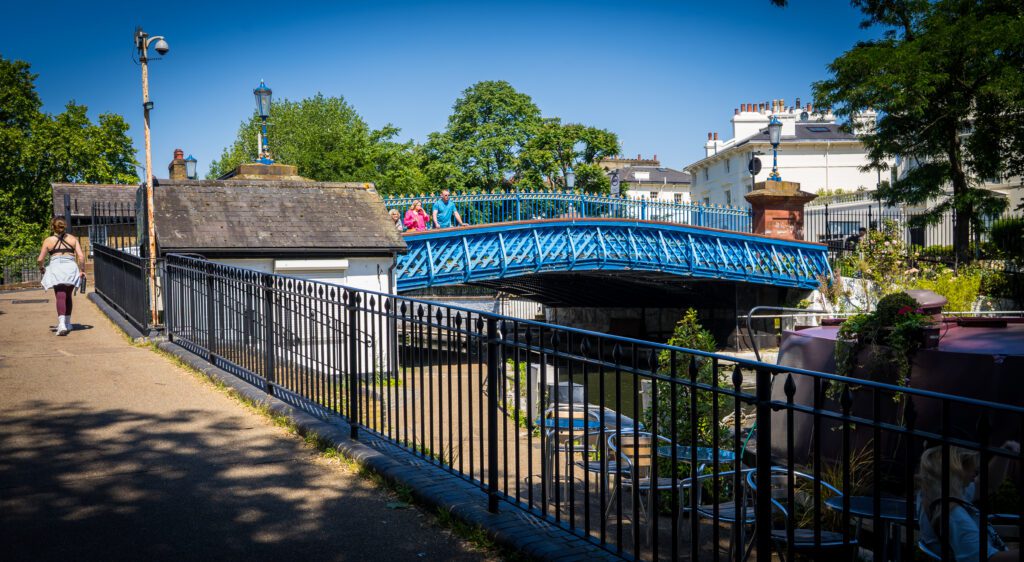 A blue pedestrian bridge over Regent's canal