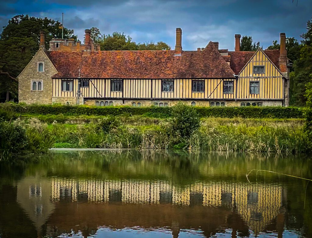 Ightham Mote House with lake in foreground