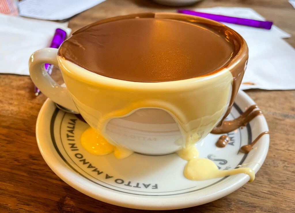 Italian Bear Hot Chocolate with triple chocolate over the cup rim