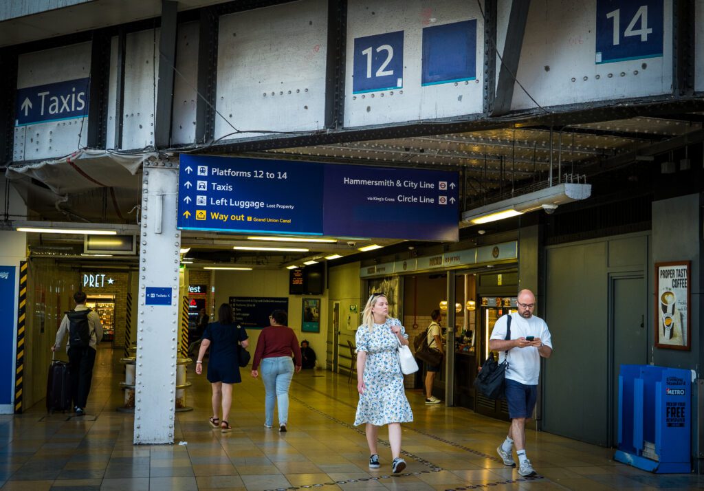 Paddington train station with signs to platforms 12 and 14