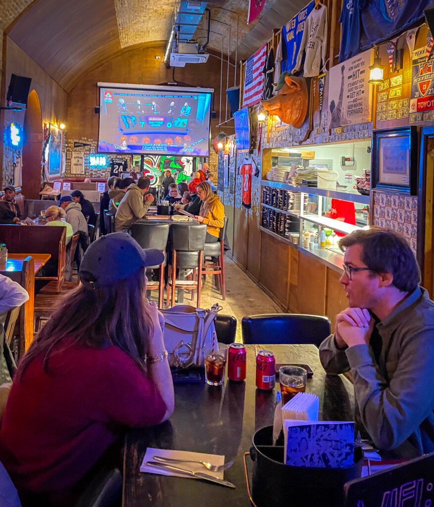 Tables inside Passyunk sports bar