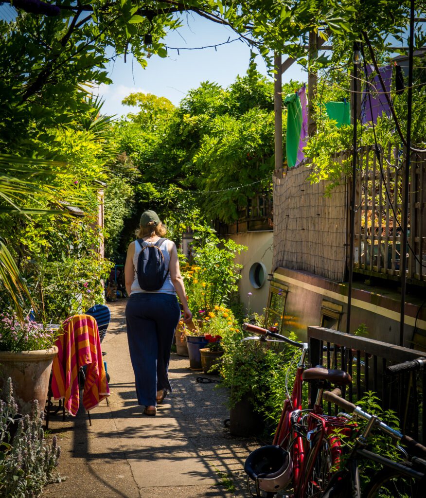 Walking along Regent's Canal through the boat moorings