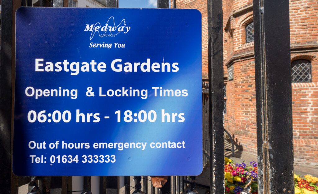 Eastgate Gardens Sign with opening hours