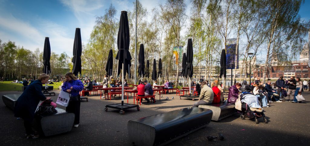 Benches and umbrellas outside the Tate Modern