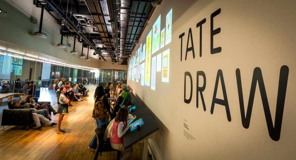 Children creating digital art at Tate Draw