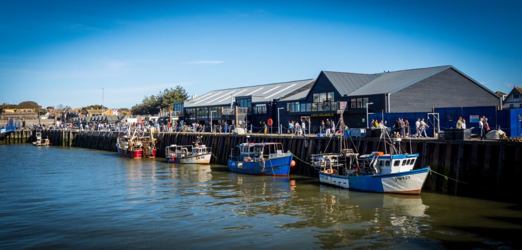 Shops and boats at Whitstable harbour
