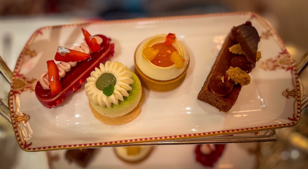 Four patisseries on a serving plate