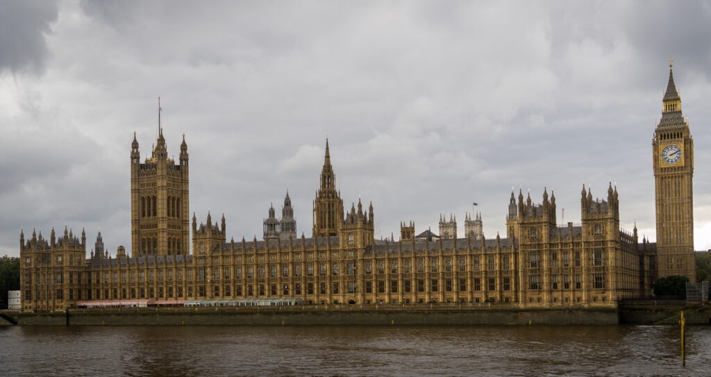 A view of the Houses of Parliament from across the River Thames