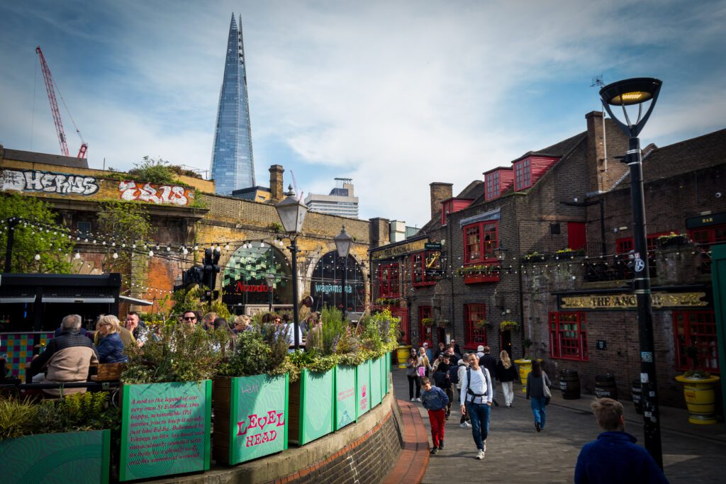The Southbank walkway going past The Anchor Pub with outdoor seating area