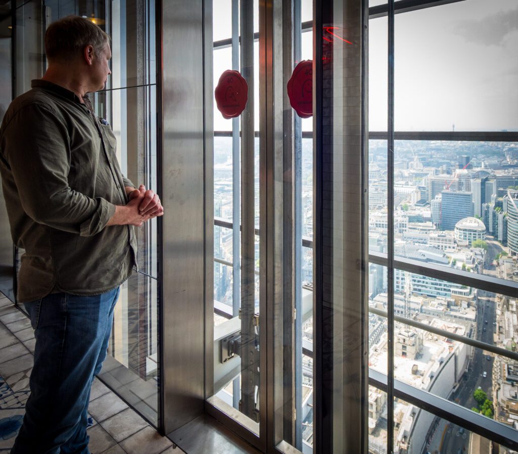 Waiting for the lift with a view of London