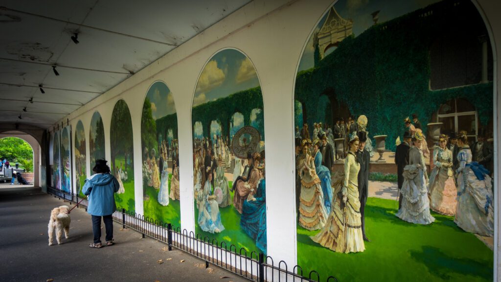 Faux archway with paintings between the arches of a Georgian garden party