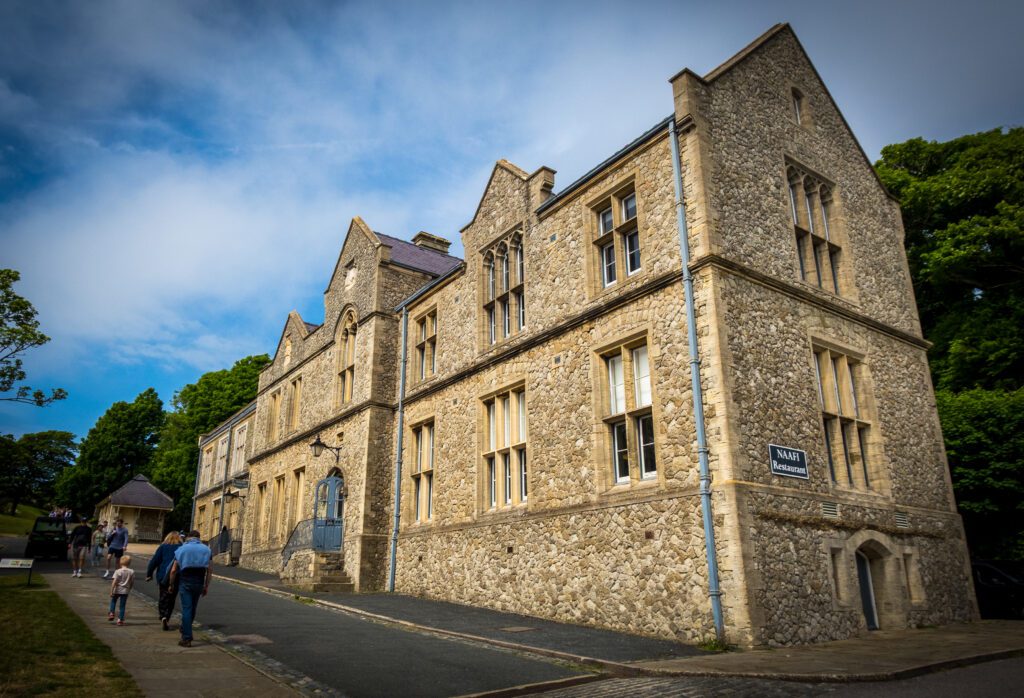 A stone building on a slight hill which hosts a restaurant at Dover Castle