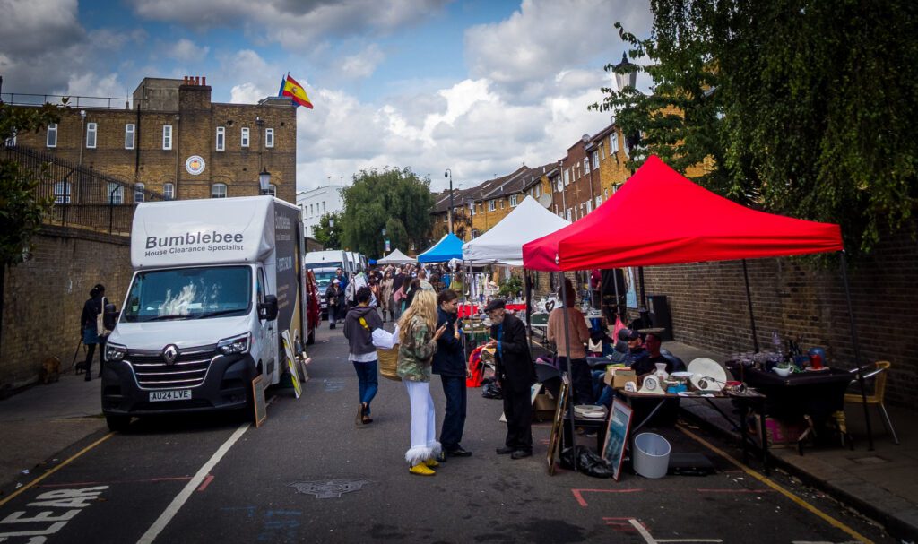 Antique market stalls lining the road
