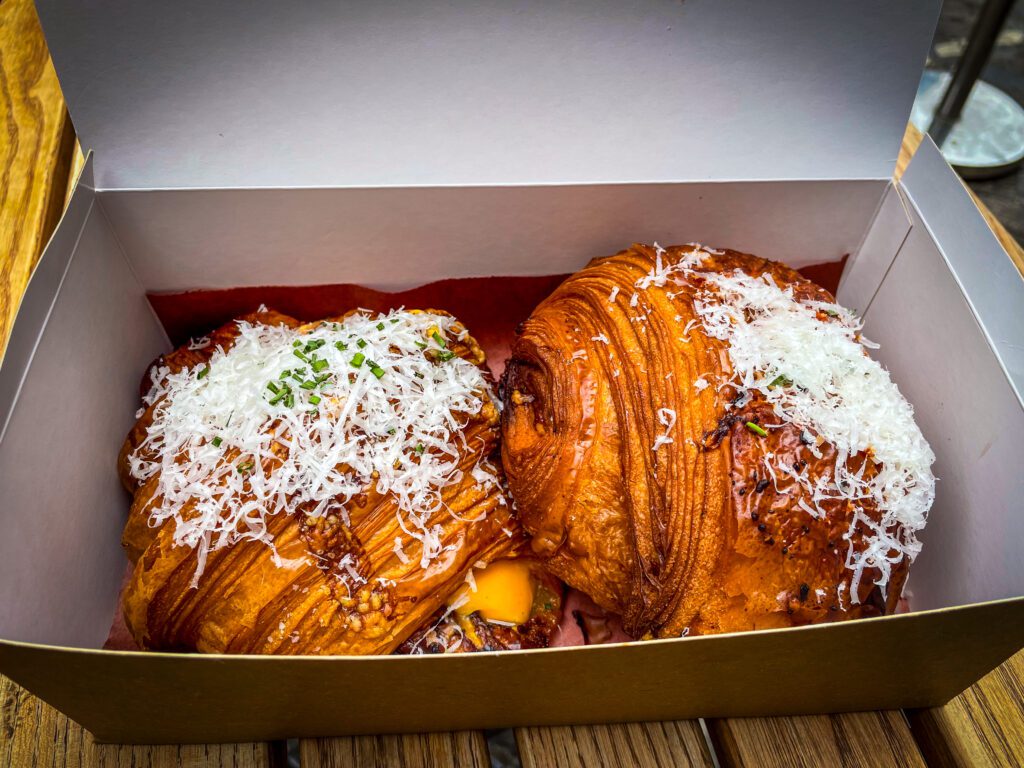 Savoury croissants in a takeaway box from Chestnut Bakery