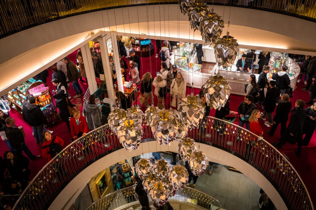 hanging Christmas decorations inside Fortnum and Mason