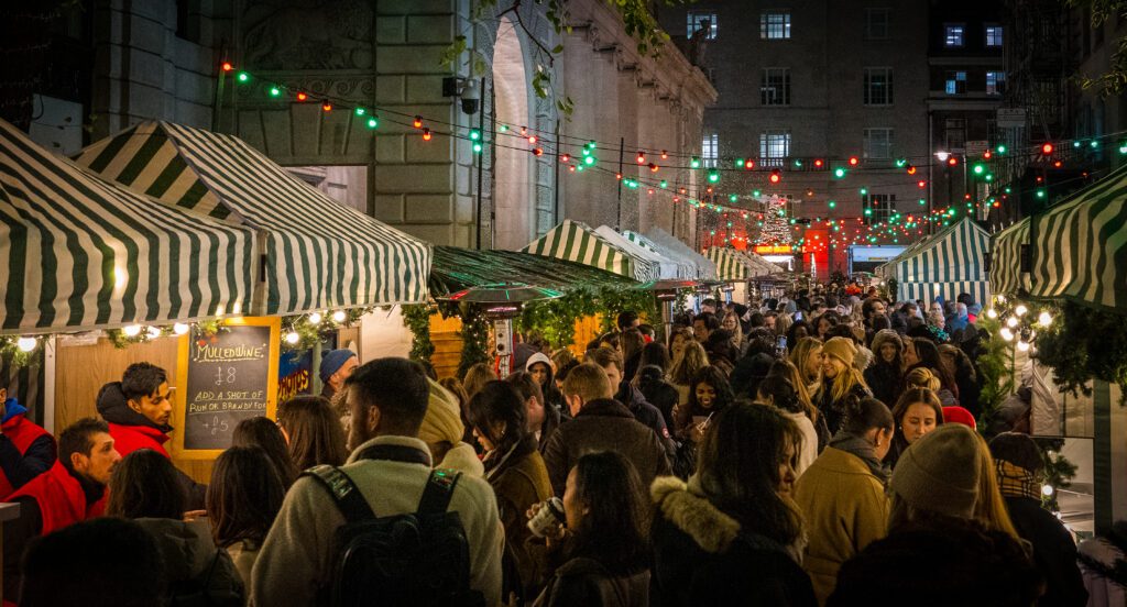 Crowds and stalls at the Mayfair Christmas Market