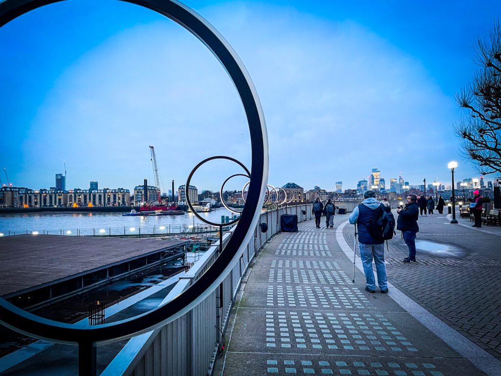 Hoops of light along the handrail by the River Thames