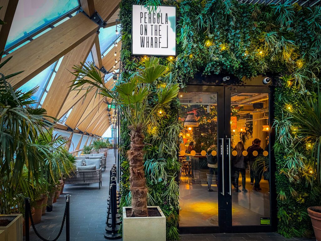 Entrance to a bar, Pergola on the Wharf at Crossrail Place