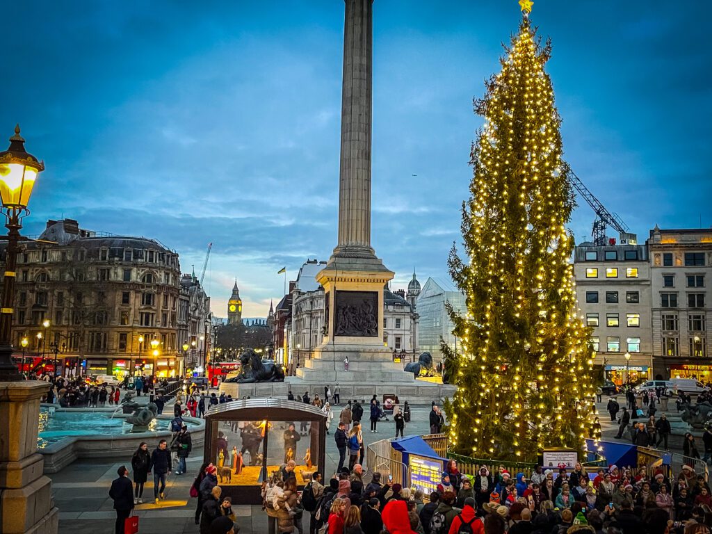 Christmas Tree at Trafalgar with a nativity scene and a choir of school children