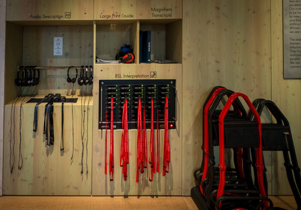 Headphones for audio description, tablets for BSL interpretation and large print guides