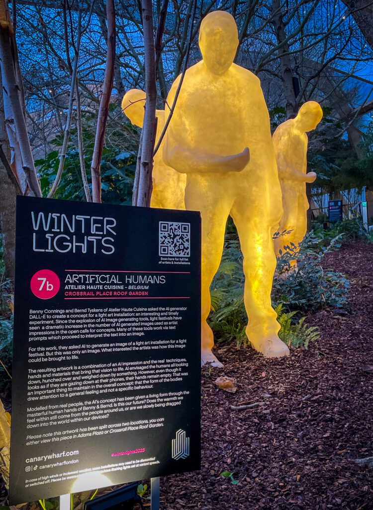 Light display of human shapes lit up from within.