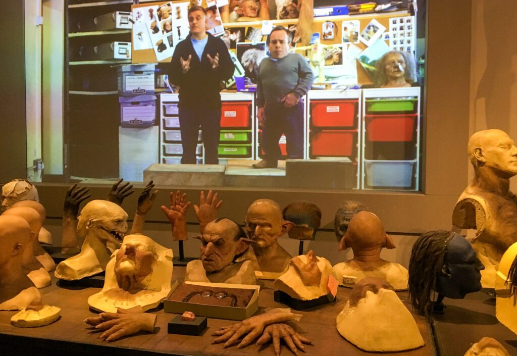 Prosthetic masks and hands on display